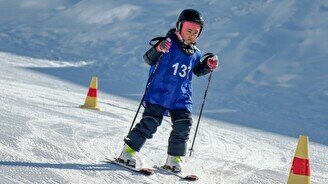 Обучение катанию на горных лыжах для детей