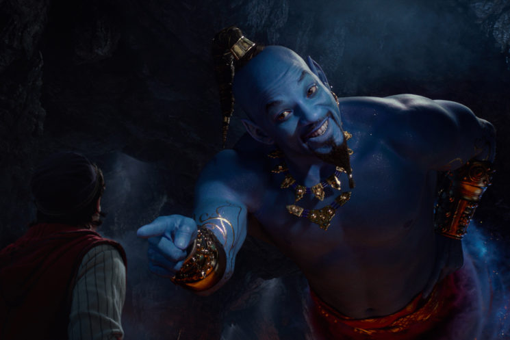 Aladdin (Mena Massoud) meets the larger-than-life blue Genie (Will Smith) in Disney’s live-action adaptation ALADDIN, directed by Guy Ritchie.