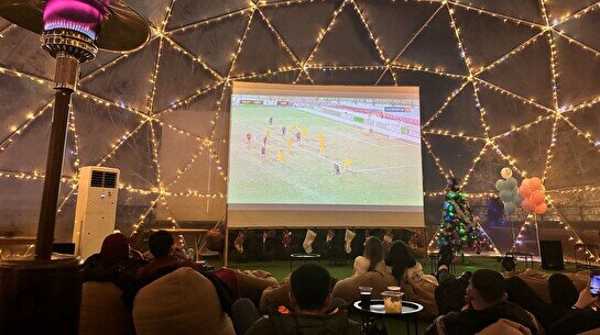 Показ игр Лиги чемпионов на крыше под открытым небом